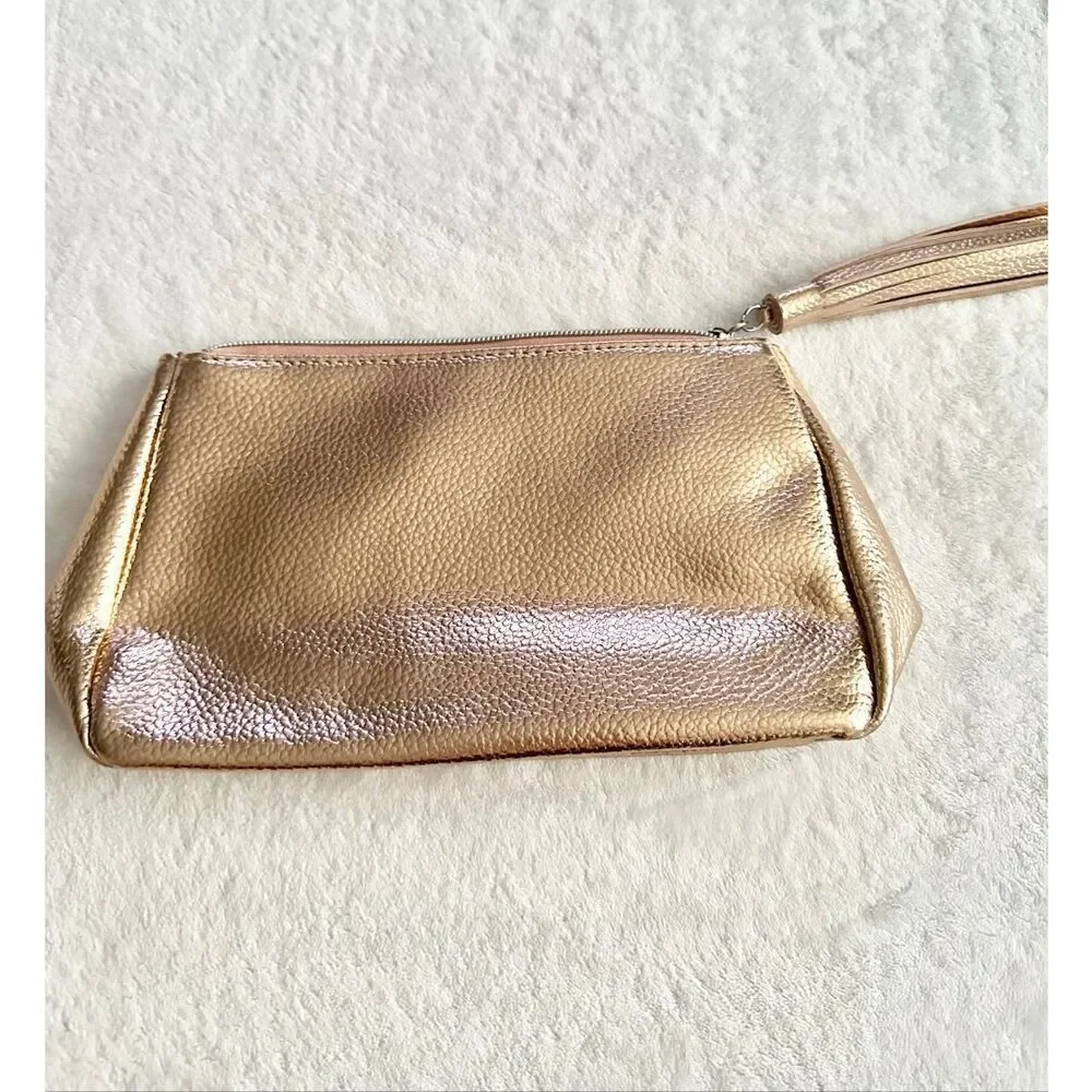 Nordstrom‘s Rose gold cosmetic bag with tassel